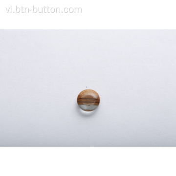 Nút gỗ kích thước bình thường có hoa văn